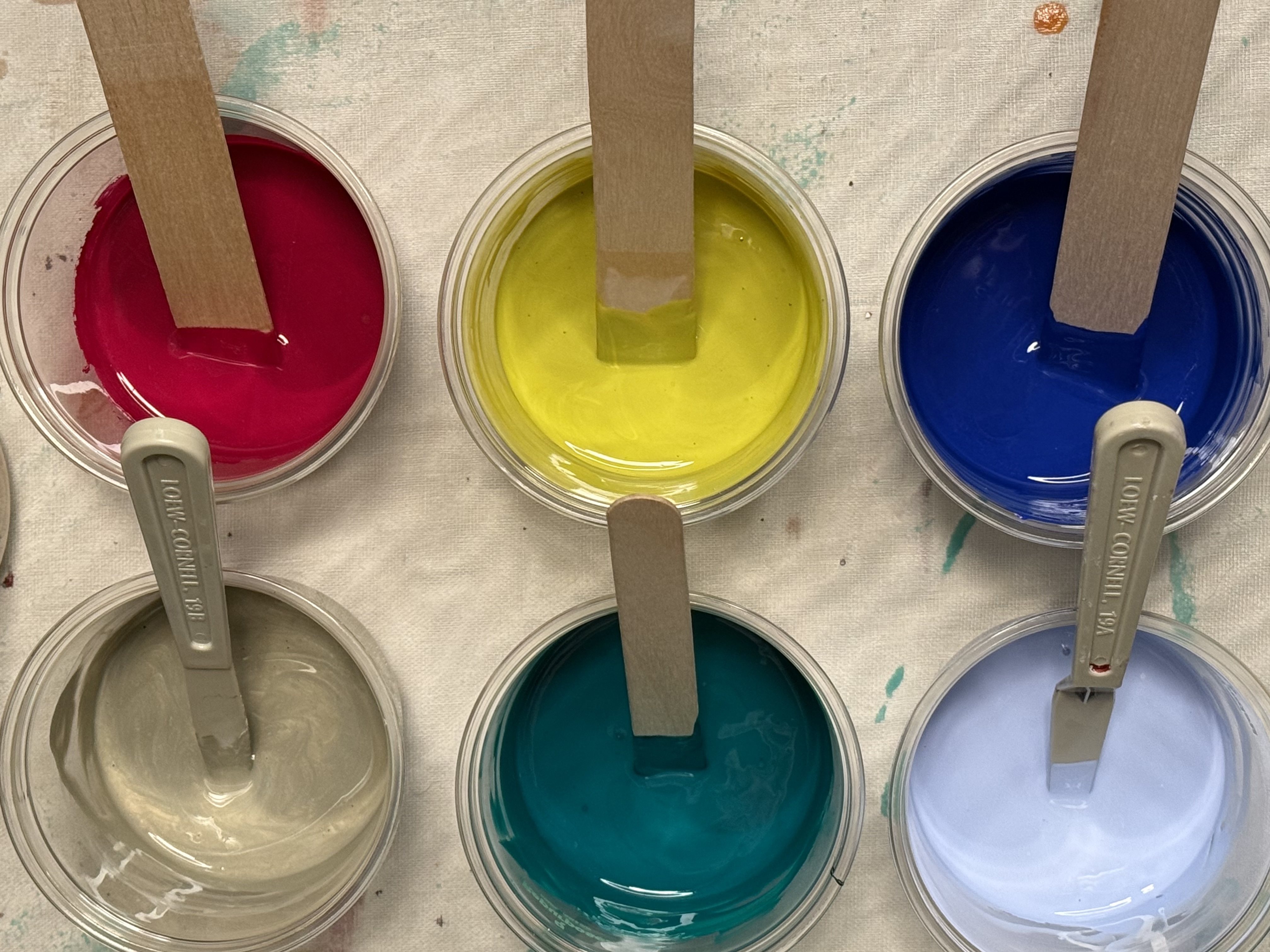 Studio paint cups with stirrers